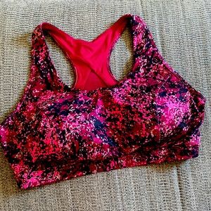 Pink and black sports bra.